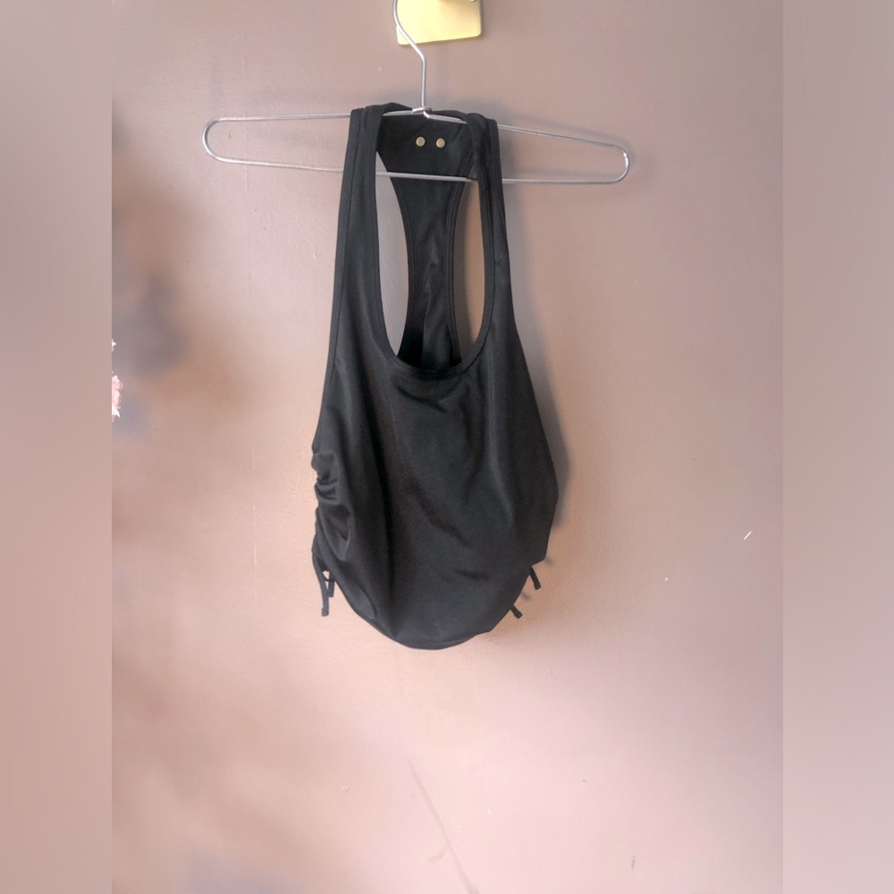 Crop active gym top. Shiny black. Part nylon part spandex.